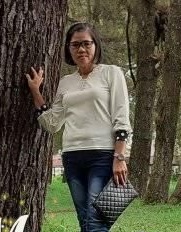 <center>TU<br>Mike Mentje Mokosolang</center>